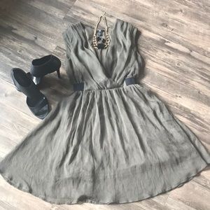 A sleeveless green dress